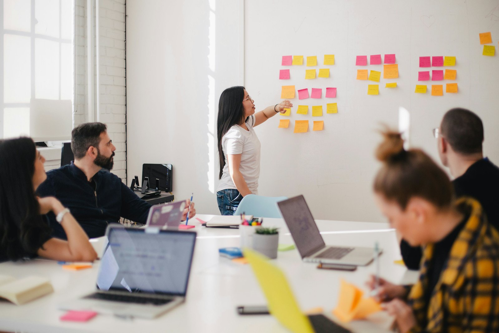 An agency team planning a campaign with sticky notes