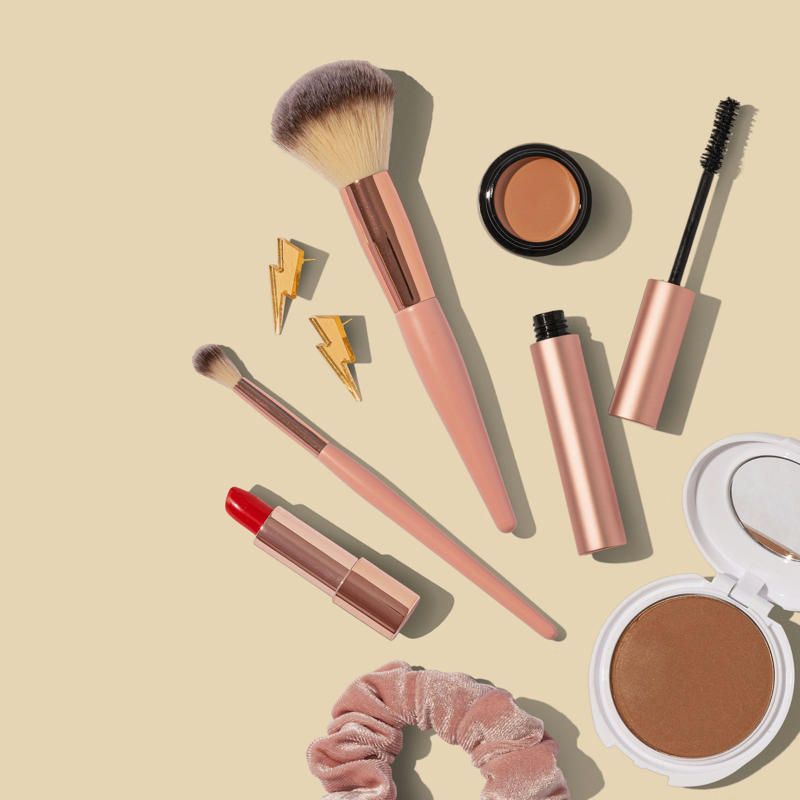 Make-up brushes and products on a table